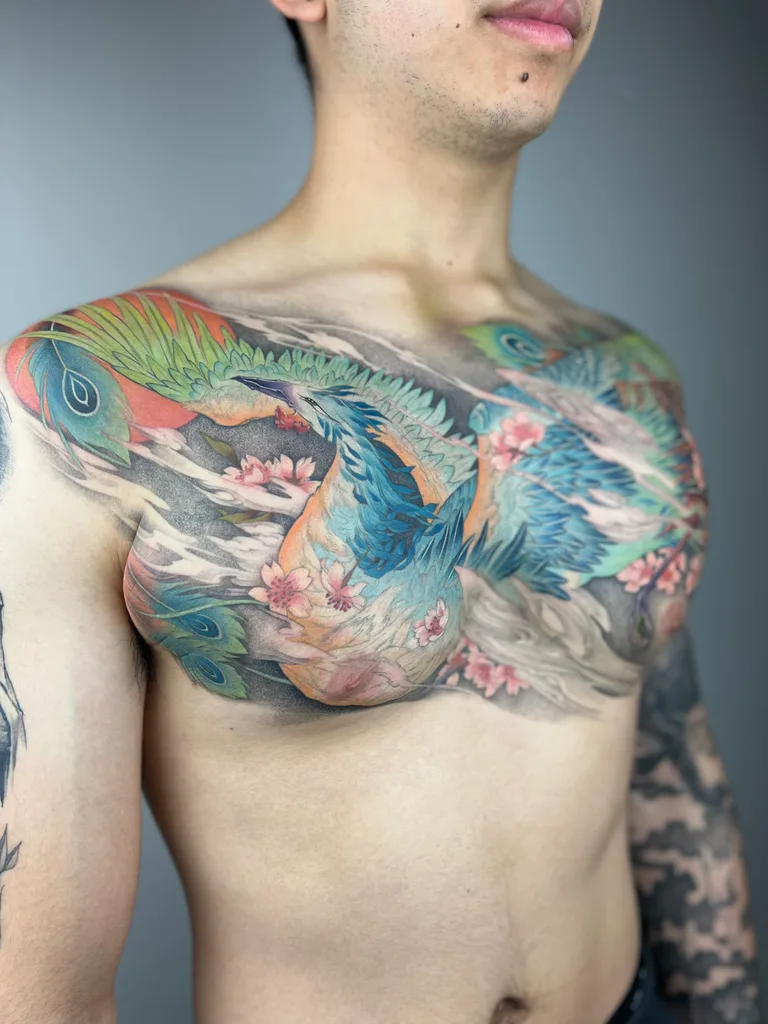 chinese-brush-painting-chest-men-cranes-waves-24 Cranes waves tattoo design for men, Chinese brush painting style, on the full chest, cranes flying through waves and clouds in soft color, covering the chest from shoulder to shoulder