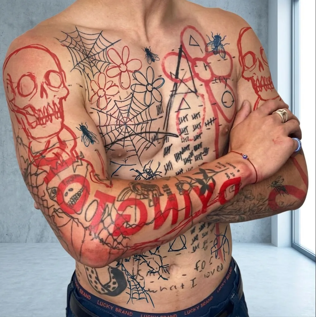 Skulls tattoo design for men, ignorant style, on the full sleeve, a full torso covering of various doodle-like motifs, including skulls, flies, spiderwebs, tally marks, and flowers, all in black and red ink