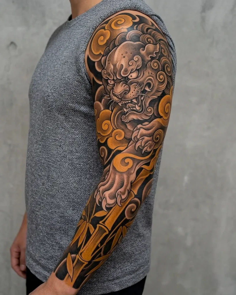 Foo dog tattoo design for women, Japanese style, on the full sleeve, with bamboo and clouds in black, grey, and yellow inks